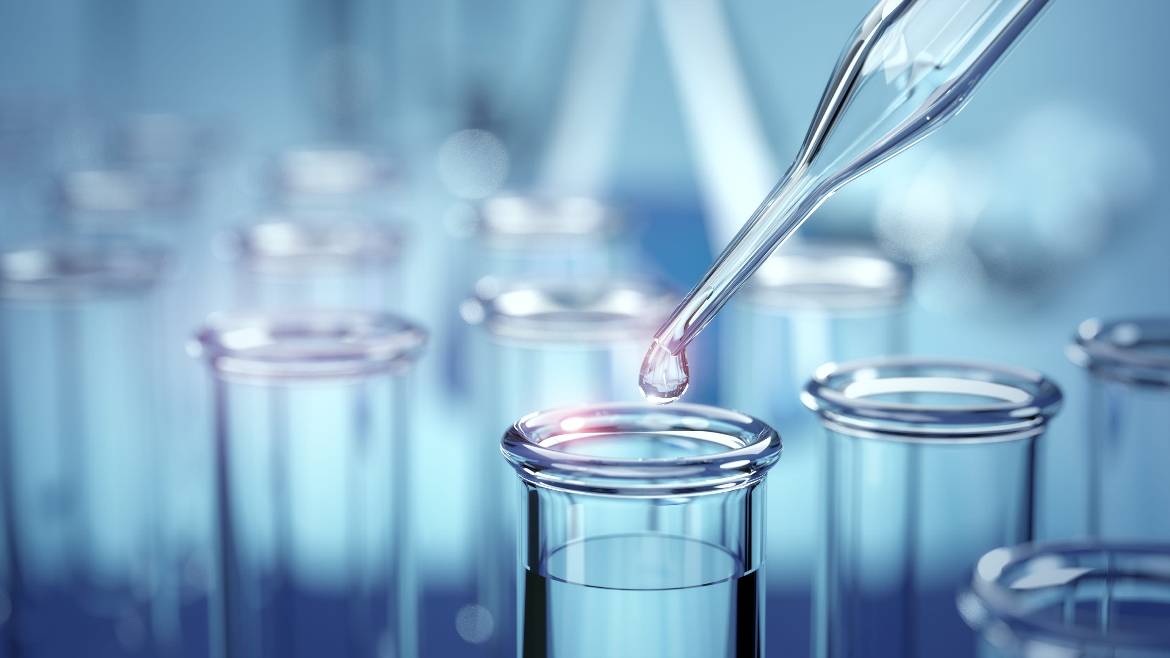 Laboratory technician analyzing chemical treatment samples
